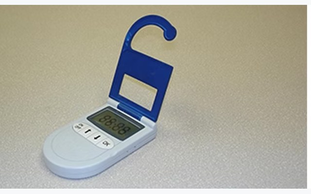 AutoParq in-vehicle parking device with mirror hook